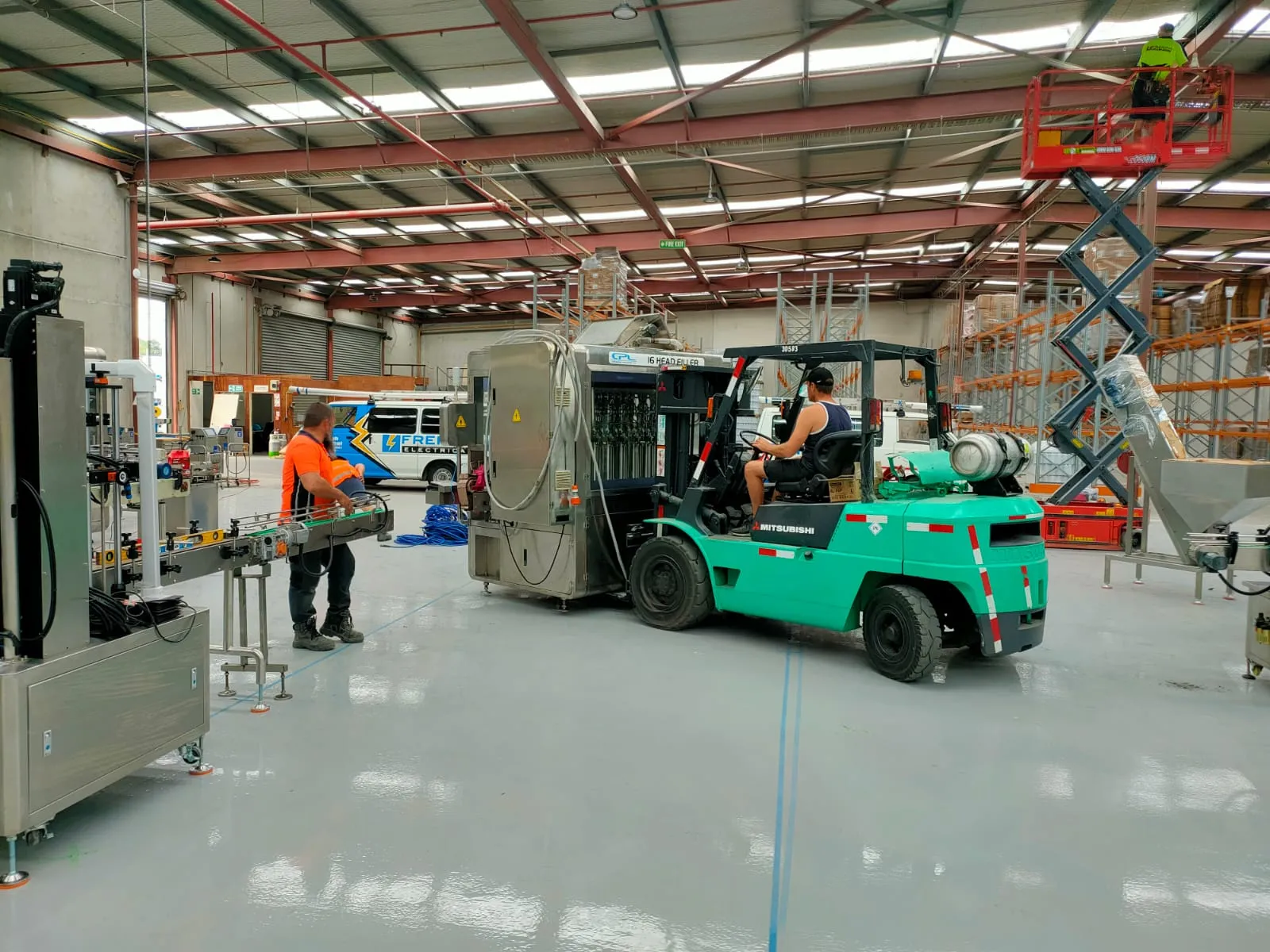 Warehouse fitted out with emergency lighting testing Auckland compliant fittings