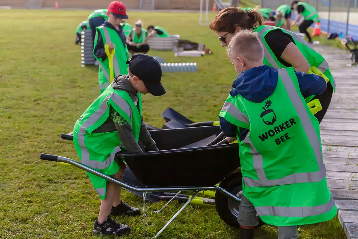 Children planting in a community garden