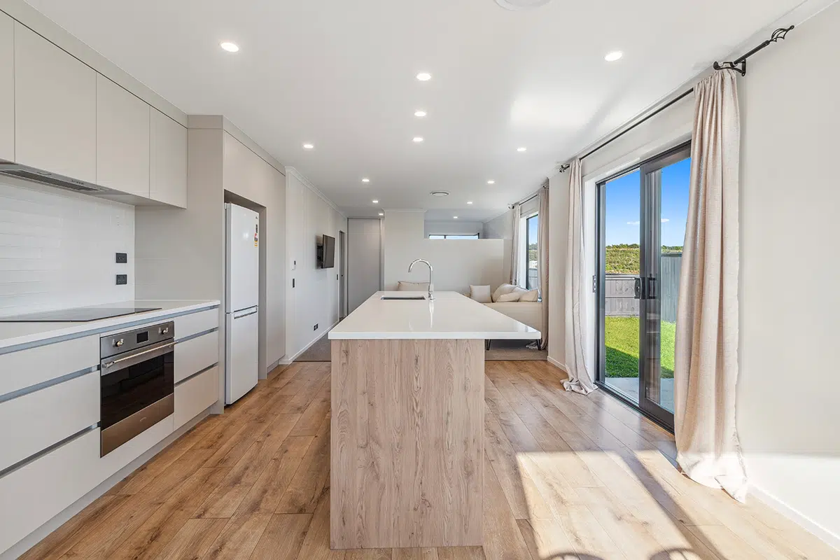Kitchen ceiling light fixture being inspected during residential electrical services